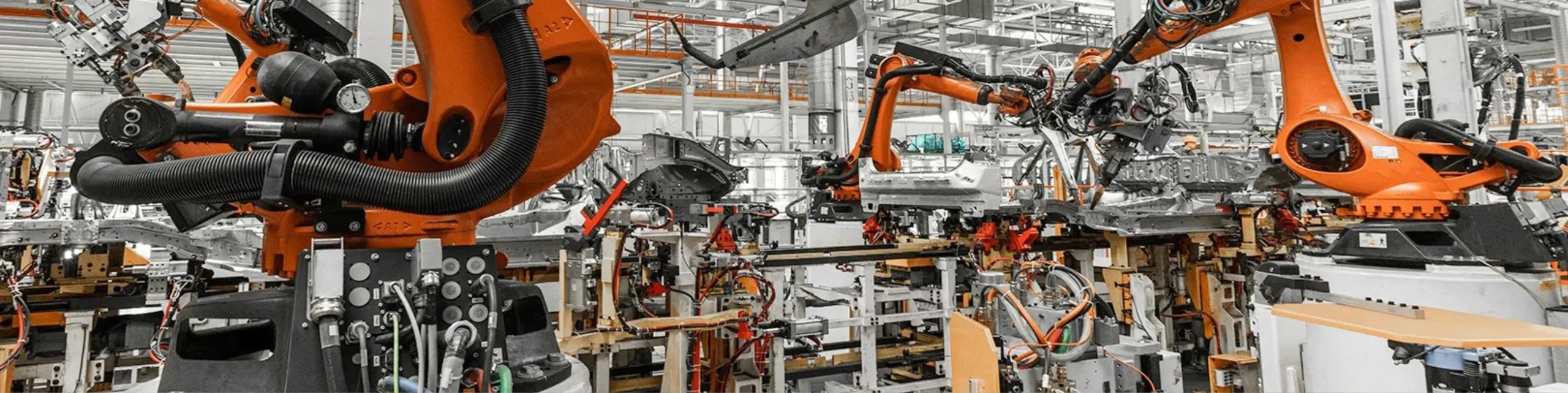 Automated robotic assembly line in automotive manufacturing plant